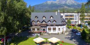 Dovolenka v centre Tatranskej Lomnice s wellness v penzióne Encián