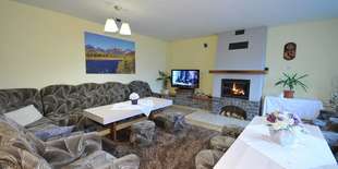 Spoločenská miestnosť s krbom, TV-SAT a posedením