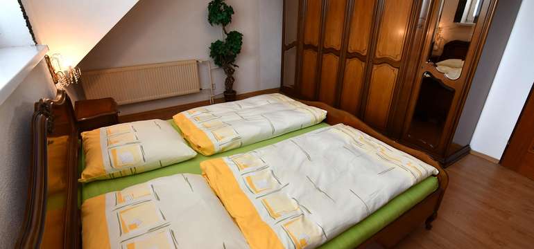Ubytovanie vo veľkom hornom apartmáne s 3 spálňami (6+1)