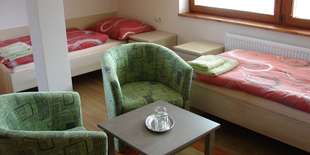 Izba môže byť s manželskou posteľou alebo s oddelenými lôžkami