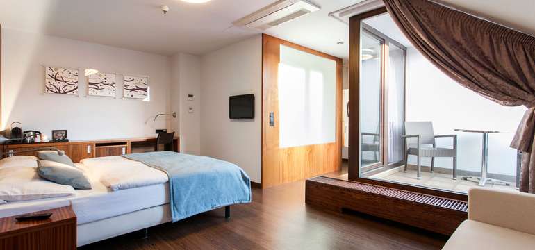 Izba Suite Executive:  Priestranná luxusná izba na štvrtom (hornom) poschodí