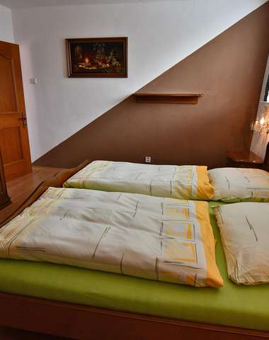 Ubytovanie vo veľkom hornom apartmáne s 3 spálňami (6+1)