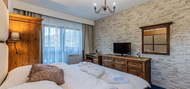 Všechny pokoje mají balkon s krásným výhledem na Tatry.