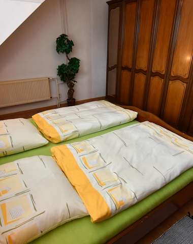 Ubytovanie vo veľkom hornom apartmáne s 3 spálňami (6+1)