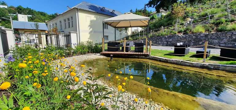 Boutique Hotel SIGLISBERG **** leží uprostred dedinky Štiavnické Bane