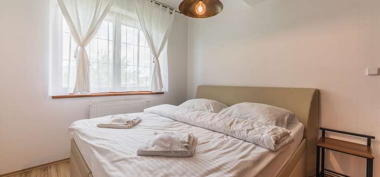 Ubytovanie  v 28 moderne zariadených, dvojlôžkových apartmánoch v 3 kategóriách