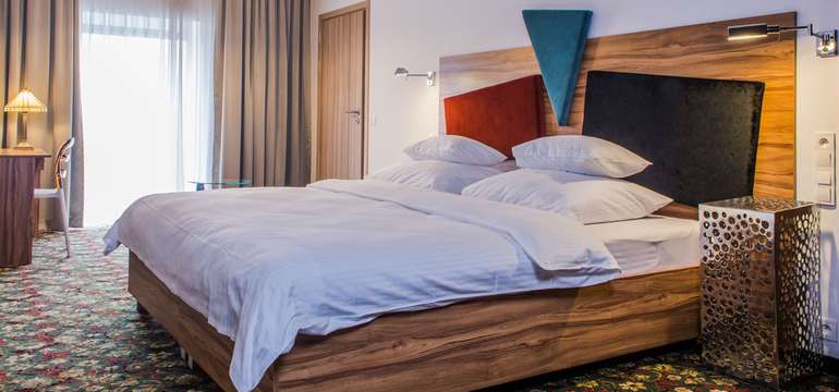 Standardní pokoj v hotelu Lenart**** – můžete se zde ubytovat i se svým domácím mazlíčkem