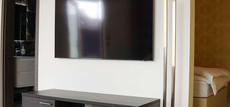 Izba Luxury je vybavená jedálenským kútikom, minibarom a LCD TV