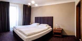 Moderné vybavenie apartmánu: kvalitné matrace, king size posteľ a antialergická bielizeň