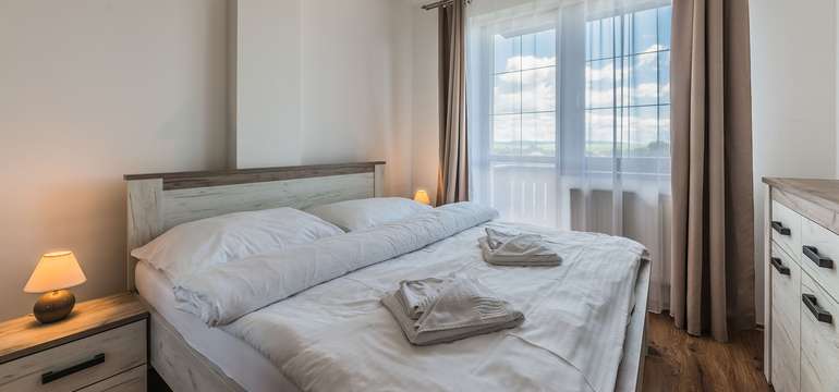 Ubytovanie  v 28 moderne zariadených, dvojlôžkových apartmánoch v 3 kategóriách