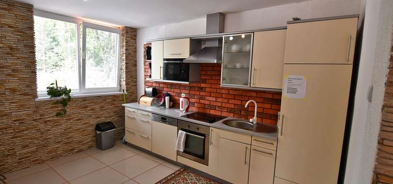 Ubytovanie vo veľkom hornom apartmáne s 3 spálňami (6+1)