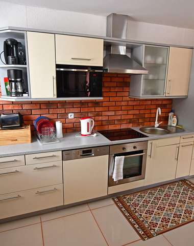 Ubytovanie vo veľkom hornom apartmáne s 3 spálňami (6+1)