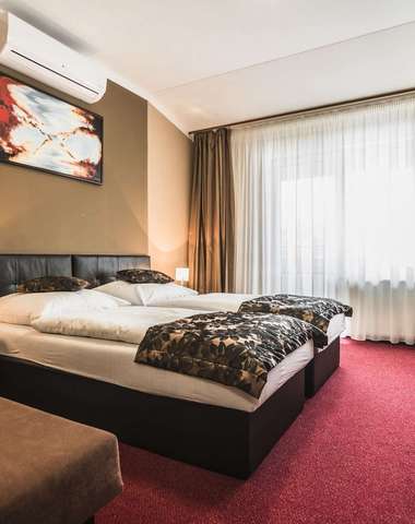 Moderne zariadené izby ponúkajú hosťom hotela Glamour**** pohodlné ubytovanie
