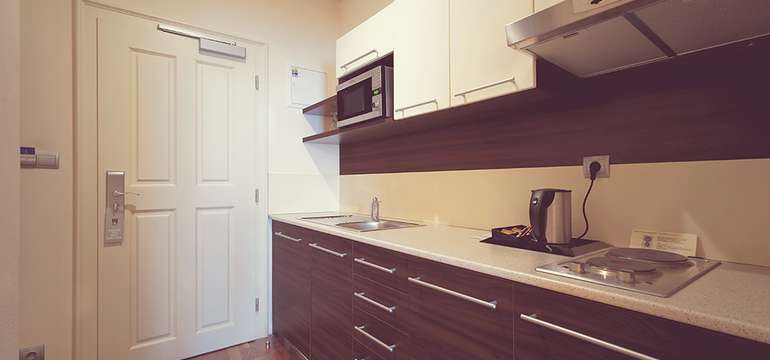 Niektoré z apartmánov sú vybavené aj kuchynským kútom