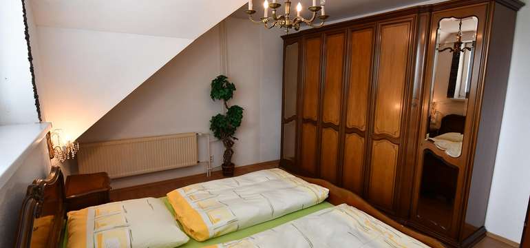 Ubytovanie vo veľkom hornom apartmáne s 3 spálňami (6+1)