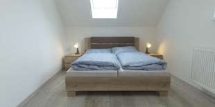 Na poschodí sa nachádzajú 2 izby, každá z nich má 2 lôžka