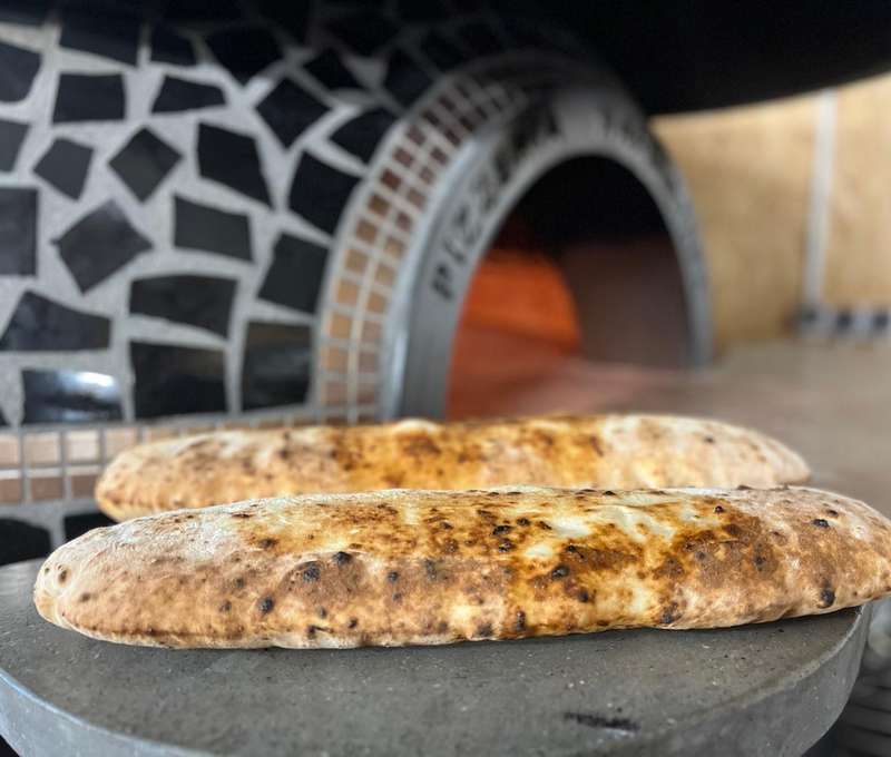 Pravá talianska pizza a panuozzi v reštaurácii Italianissimi