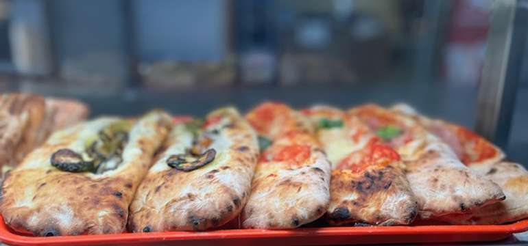 Pravá talianska pizza a panuozzi v reštaurácii Italianissimi