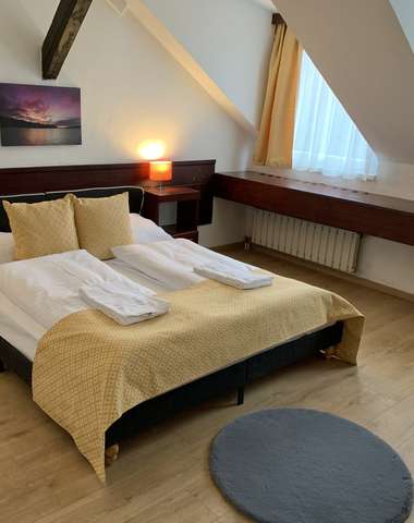 Štvorlôžkový apartmán s prístelkou a klimatizáciou v hoteli Gloria***