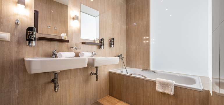 Apartmány Deluxe (2 + 2 osoby) v hoteli Altis**** vám poskytnú veľkorysý priestor